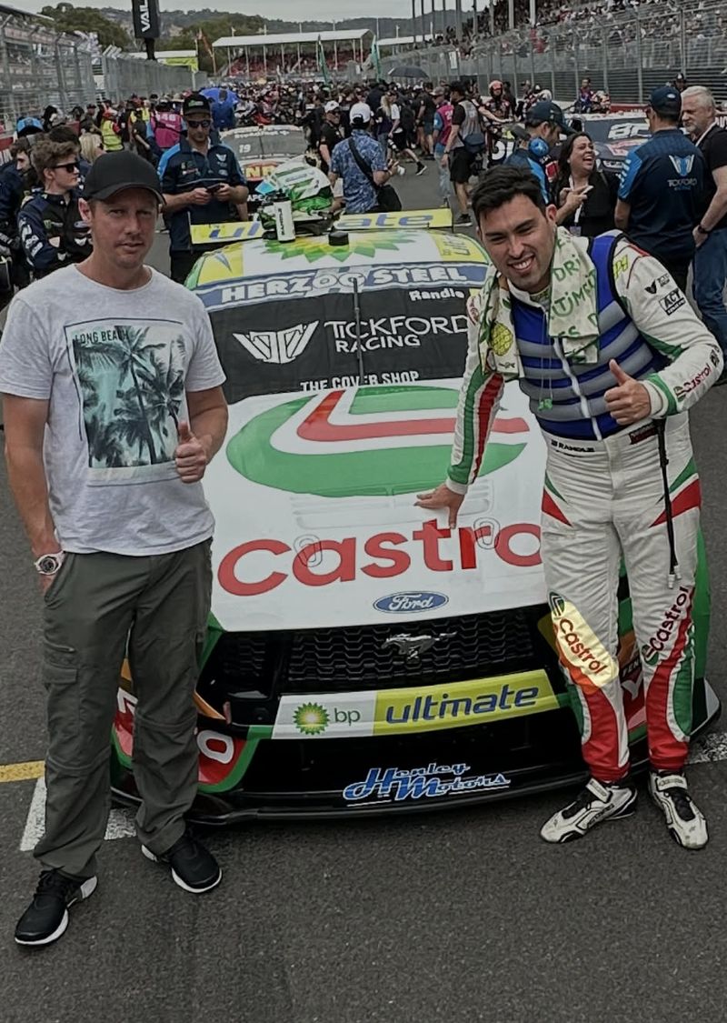 Henley Motors branding on Tickford Racing's Ford Mustang Supercar at the racetrack